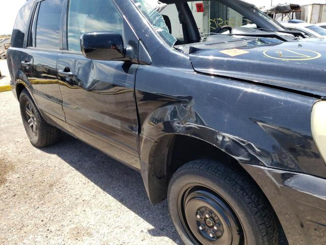 Photo 9 from auction – 2003 HONDA PILOT EX with VIN 2HKYF18423H592653