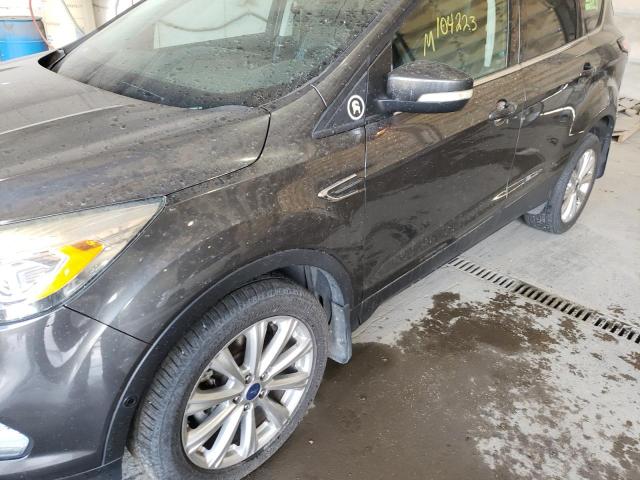 Photo 9 from auction – 2017 FORD ESCAPE TIT with VIN 1FMCU9J95HUD59587