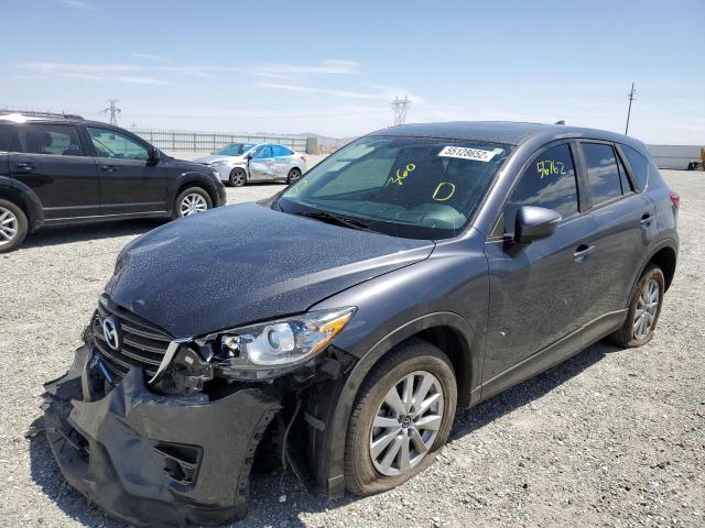 Photo 2 from auction – 2016 MAZDA CX-5 TOURI with VIN JM3KE2CY2G0902075