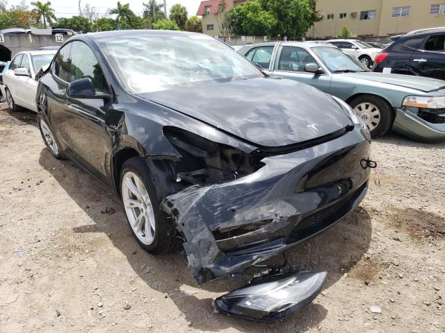 TESLA MODEL Y 2021 with VIN 5YJYGDED3MF107455 - Photo from auction