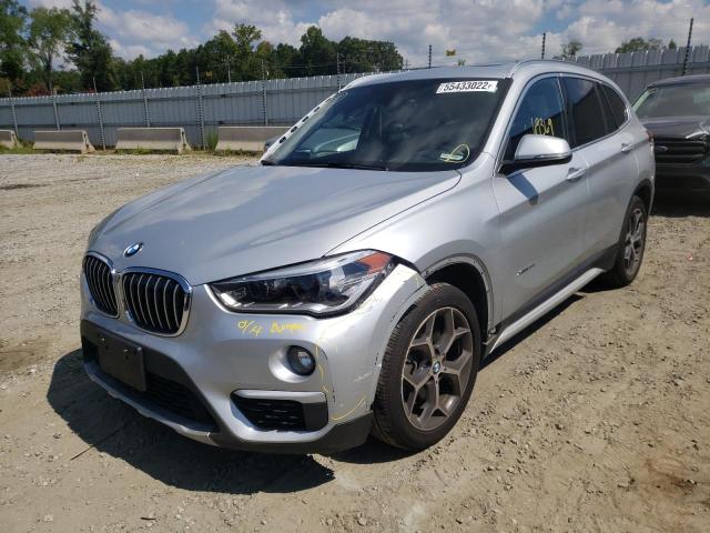 Photo 2 from auction – 2016 BMW X1 XDRIVE2 with VIN WBXHT3C34G5E53297