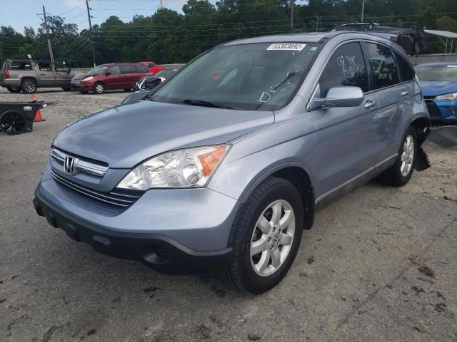 Photo 2 from auction – 2009 HONDA CR-V with VIN 5J6RE38769L009366
