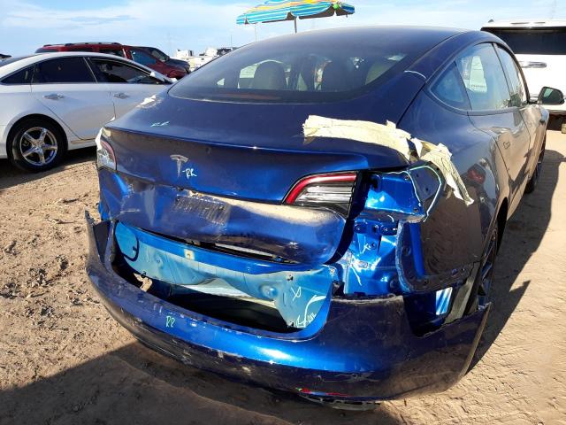 Photo 9 from auction – 2021 TESLA MODEL 3 with VIN 5YJ3E1EA2MF092306