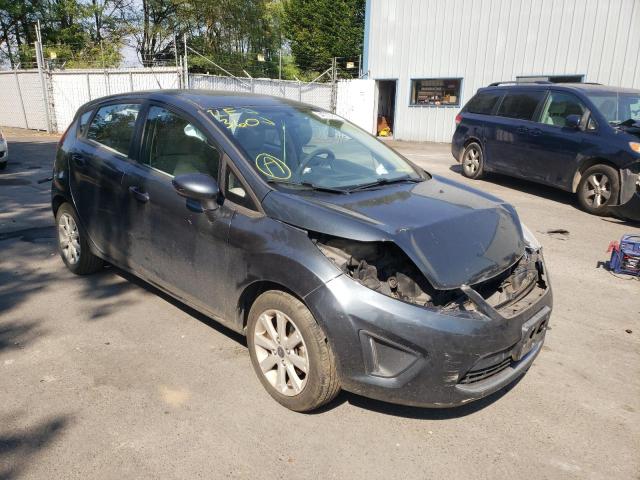 FORD FIESTA SE 2011 with VIN 3FADP4EJ5BM180412 - Photo from auction