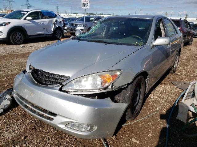 Photo 2 from auction – 2004 TOYOTA CAMRY LE with VIN 4T1BF30KX4U581432