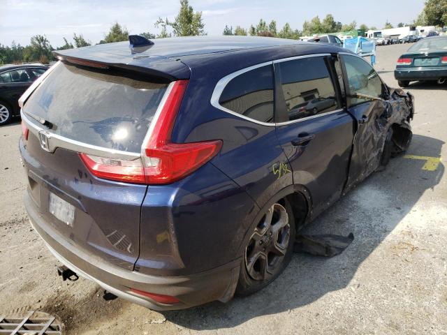 Photo 4 from auction – 2017 HONDA CR-V EXL with VIN 7FARW1H84HE011235