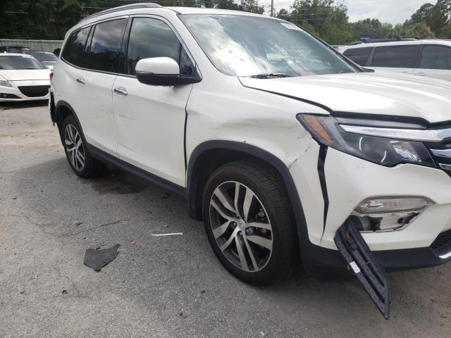 Photo 9 from auction – 2017 HONDA PILOT ELIT with VIN 5FNYF6H05HB050317