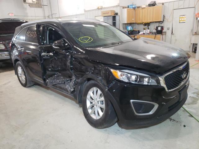 KIA SORENTO LX 2016 with VIN 5XYPG4A34GG046980 - Photo from auction