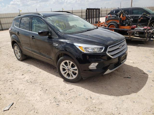 FORD ESCAPE SE 2018 with VIN 1FMCU0GD4JUA44017 - Photo from auction