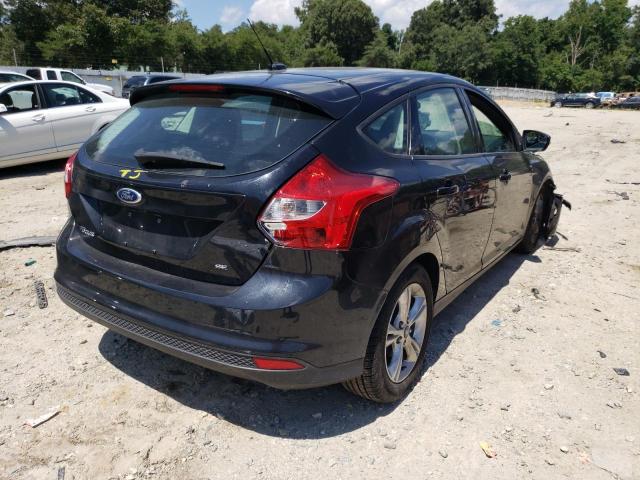 Photo 4 from auction – 2014 FORD FOCUS with VIN 1FADP3K21EL164320