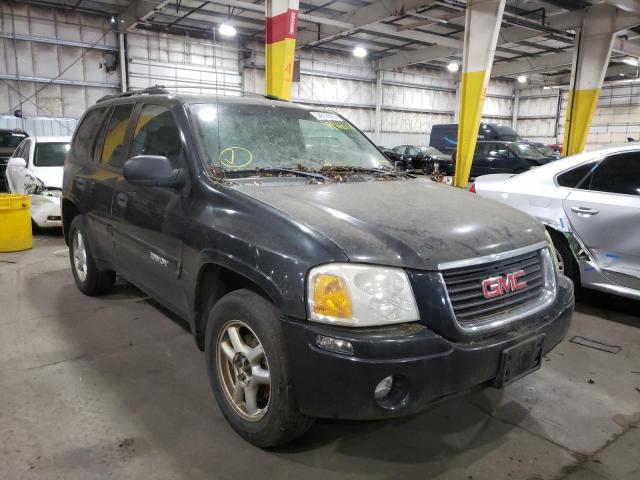 GMC ENVOY 2004 with VIN 1GKDT13SX42269536 - Photo from auction