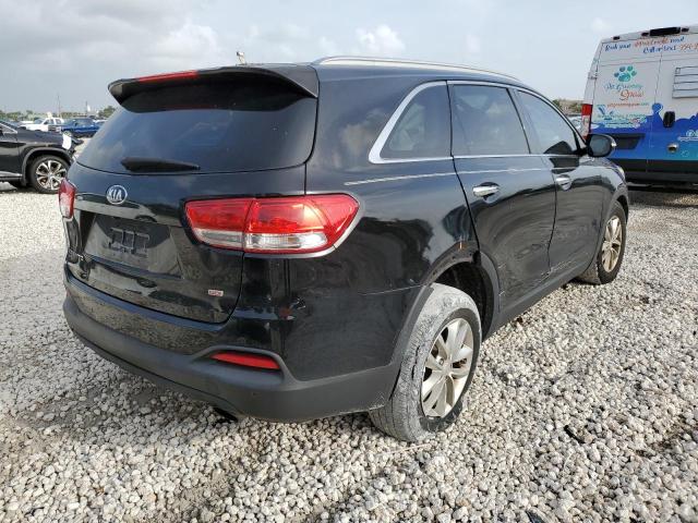 Photo 4 from auction – 2016 KIA SORENTO LX with VIN 5XYPG4A33GG015803