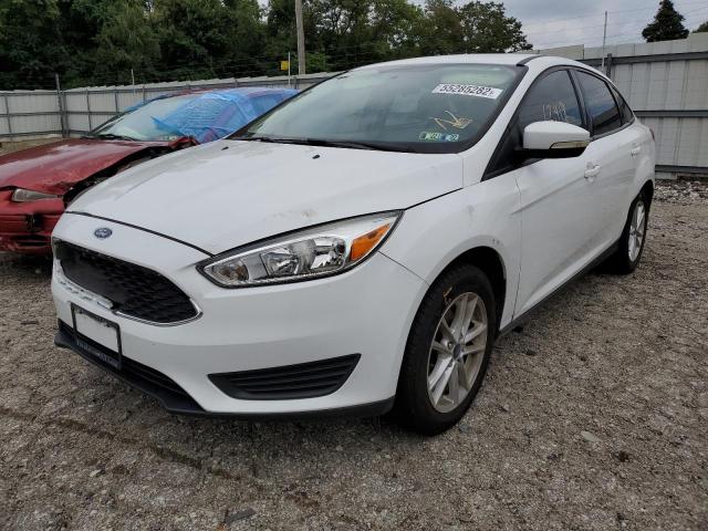 Photo 2 from auction – 2017 FORD FOCUS SE with VIN 1FADP3F24HL211242