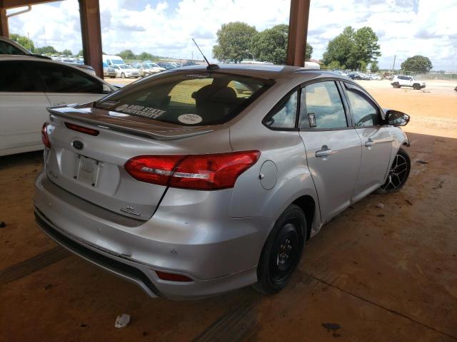 Photo 4 from auction – 2015 FORD FOCUS SE with VIN 1FADP3F24FL345357