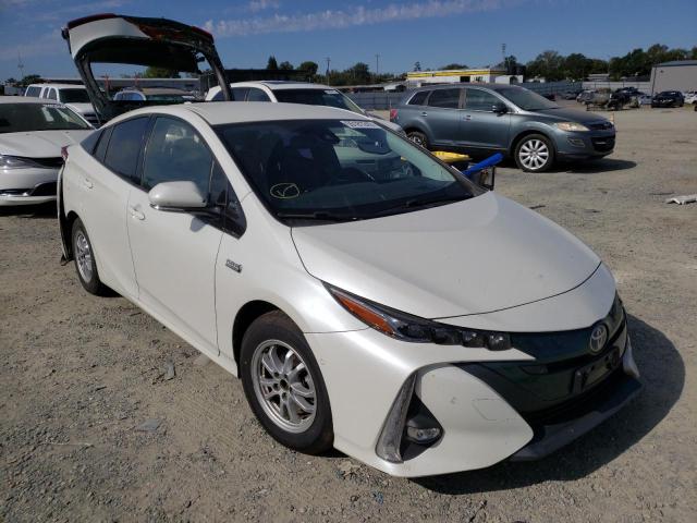 TOYOTA PRIUS PRIM 2018 with VIN JTDKARFPXJ3084648 - Photo from auction