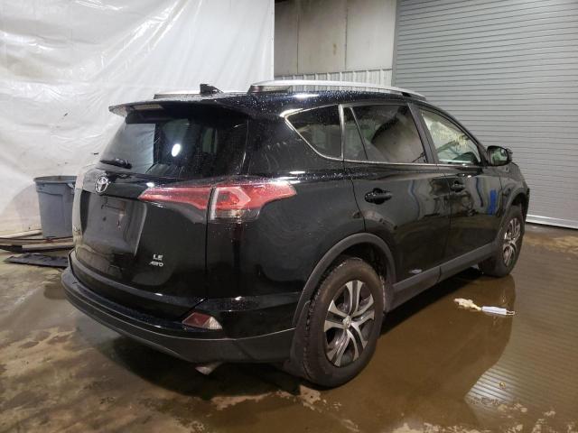 Photo 4 from auction – 2018 TOYOTA RAV4 LE with VIN 2T3BFREV1JW841256