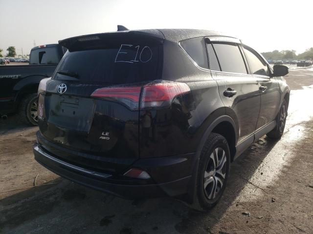 Photo 4 from auction – 2018 TOYOTA RAV4 LE with VIN 2T3BFREVXJW773717