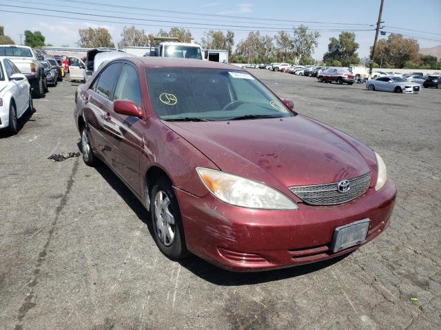 TOYOTA CAMRY LE 2002 with VIN JTDBE32K120095164 - Photo from auction