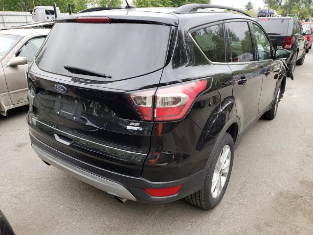 Photo 4 from auction – 2017 FORD ESCAPE SE with VIN 1FMCU9GD7HUC03790