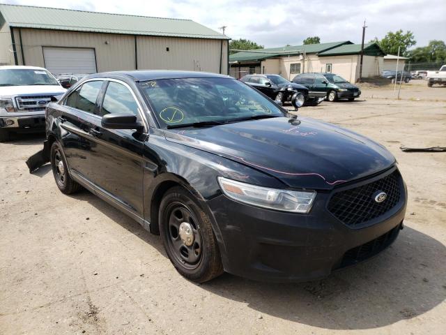FORD TAURUS POL 2014 with VIN 1FAHP2MK2EG161556 - Photo from auction