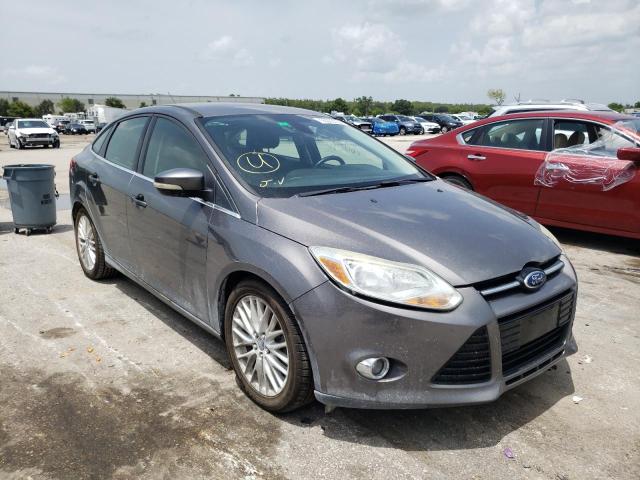FORD FOCUS SEL 2012 with VIN 1FAHP3H2XCL390412 - Photo from auction