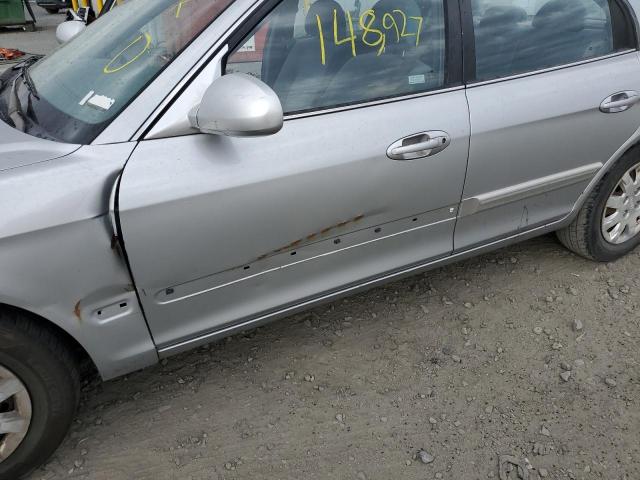 Photo 9 from auction – 2004 KIA OPTIMA with VIN KNAGD126145359129