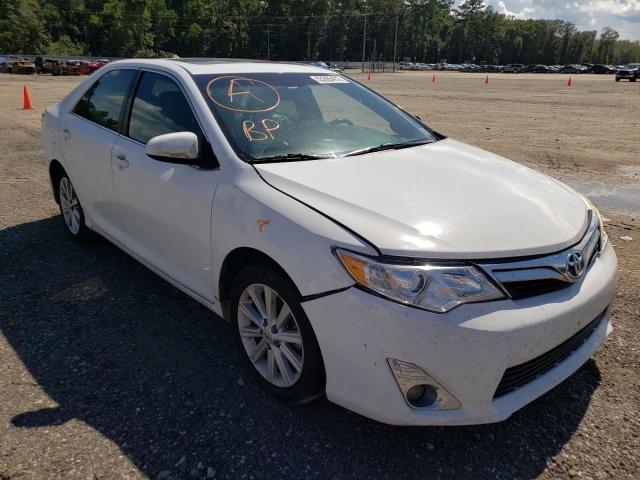 TOYOTA CAMRY HYBR 2012 with VIN 4T1BD1FK2CU034011 - Photo from auction