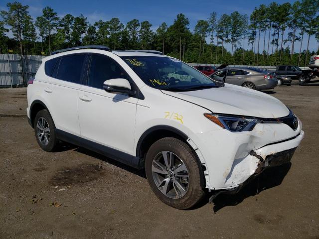 TOYOTA RAV4 XLE 2017 with VIN JTMWFREV3HJ114727 - Photo from auction