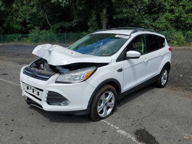Photo 2 from auction – 2016 FORD ESCAPE SE with VIN 1FMCU9GX8GUA25333