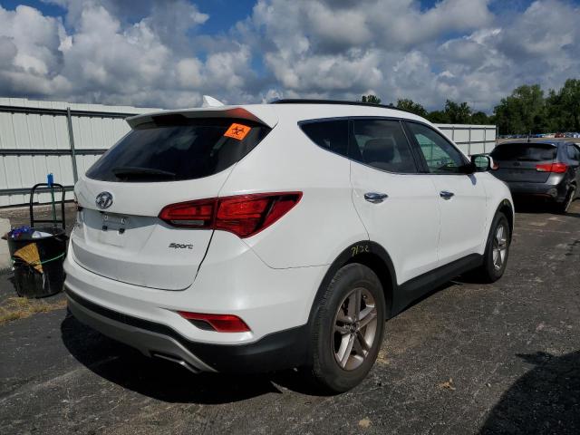 Photo 4 from auction – 2017 HYUNDAI SANTA FE S with VIN 5NMZU3LB2HH038139