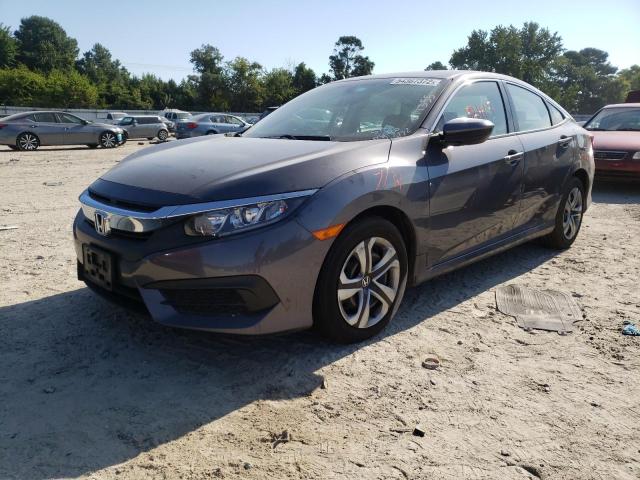 Photo 2 from auction – 2017 HONDA CIVIC LX with VIN 2HGFC2F54HH560323