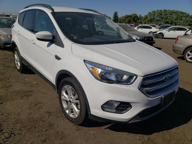 FORD ESCAPE 2018 with VIN 1FMCU0GD8JUA86559 - Photo from auction