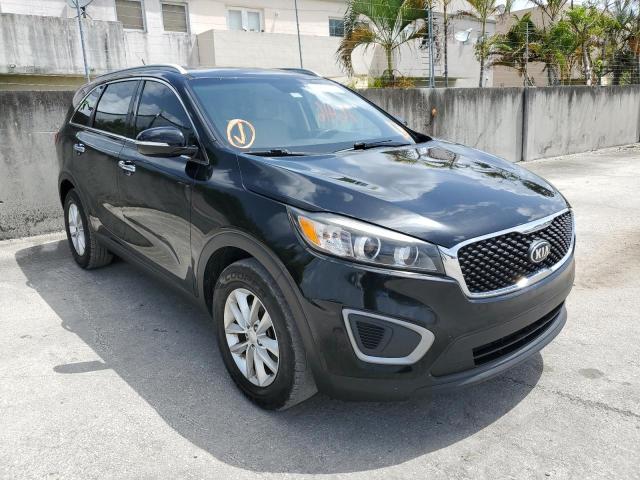 KIA SORENTO LX 2016 with VIN 5XYPG4A37GG091010 - Photo from auction