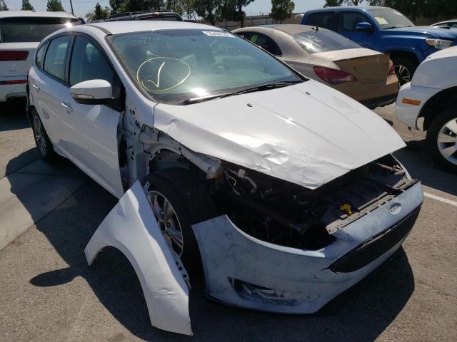 FORD FOCUS SE 2016 with VIN 1FADP3KE4GL383818 - Photo from auction