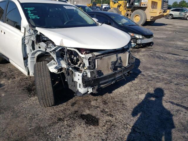 Photo 9 from auction – 2014 TOYOTA RAV4 XLE with VIN JTMWFREV1EJ008448