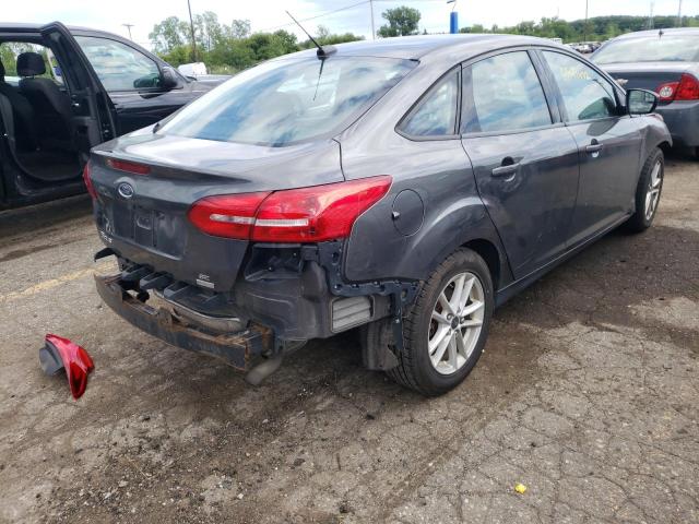 Photo 4 from auction – 2018 FORD FOCUS SE with VIN 1FADP3FE1JL295634