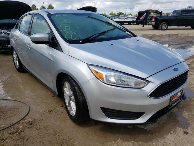 FORD FOCUS SE 2018 with VIN 1FADP3F28JL312130 - Photo from auction