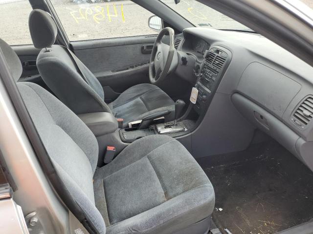 Photo 5 from auction – 2004 KIA OPTIMA with VIN KNAGD126145359129