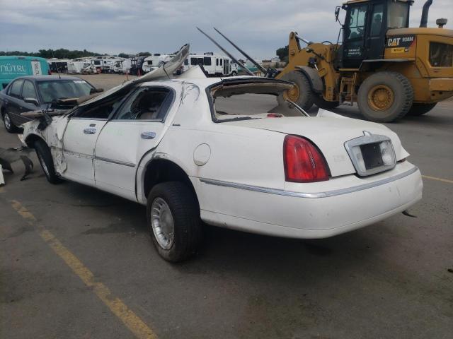 Photo 3 from auction – 2000 LINCOLN TOWN CAR E with VIN 1LNHM81W4YY888267