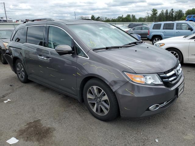 HONDA ODYSSEY TO 2014 with VIN 5FNRL5H94EB037981 - Photo from auction