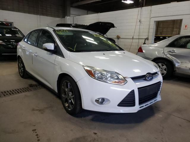 FORD FOCUS SE 2014 with VIN 1FADP3F26EL319115 - Photo from auction
