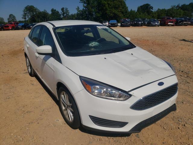 FORD FOCUS SE 2018 with VIN 1FADP3F22JL291355 - Photo from auction