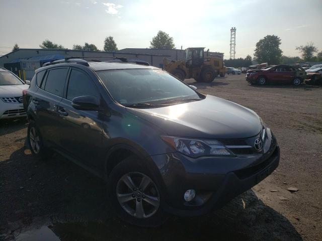 TOYOTA RAV4 XLE 2015 with VIN JTMWFREV1FJ033903 - Photo from auction