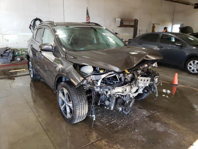 Photo 1 from auction – 2017 FORD ESCAPE SE with VIN 1FMCU9G90HUE14597