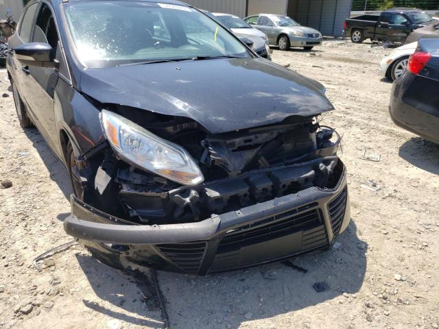Photo 9 from auction – 2014 FORD FOCUS with VIN 1FADP3K21EL164320