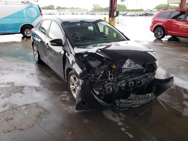 FORD FOCUS SE 2014 with VIN 1FADP3F29EL229151 - Photo from auction