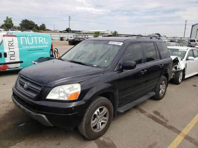 Photo 2 from auction – 2004 HONDA PILOT with VIN 2HKYF18504H578843