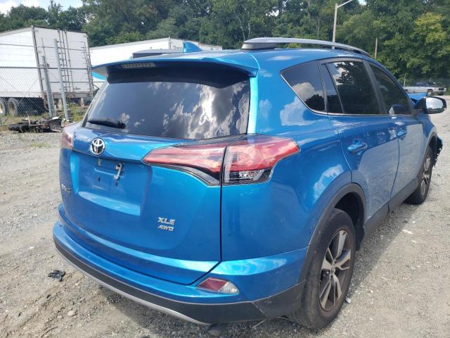 Photo 4 from auction – 2017 TOYOTA RAV4 XLE with VIN 2T3RFREV1HW676091