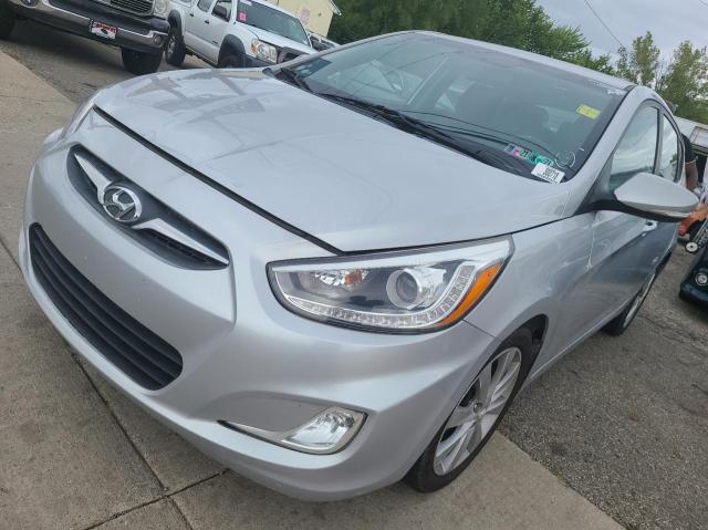Photo 2 from auction – 2014 HYUNDAI ACCENT GLS with VIN KMHCU5AEXEU173903