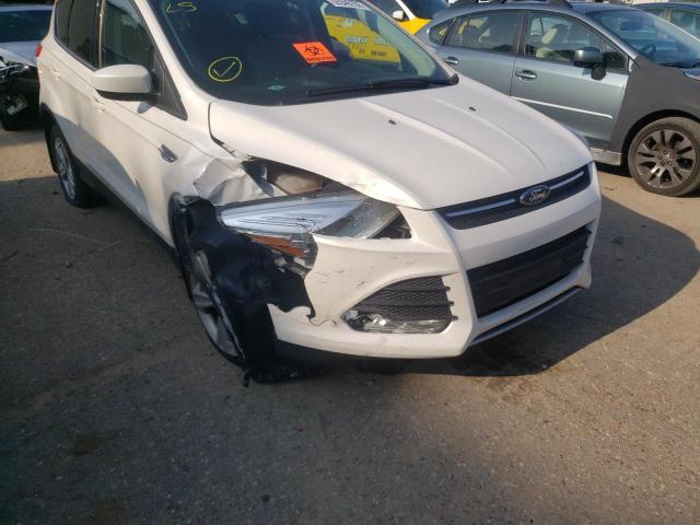 Photo 9 from auction – 2014 FORD ESCAPE SE with VIN 1FMCU9GX1EUC85084
